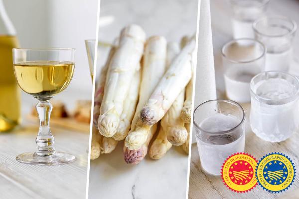 a glass of white wine, white asparagus stalks, spirit drinks and the PDO and PGI logos